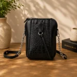 کیف مینی بگ چرم مشکی دست‌دوز با بند دوشی راویس